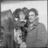 Portrait d'un reporter du SCA et d'une enfant alsacienne.