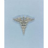 [Insignes des médecins militaires US (medical corps MC).]
