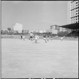 Un match de football. [Description en cours]