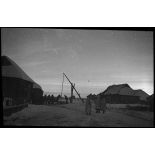 Medyn - Woronov. [Des soldats dans un village sous la neige]. [Description en cours]