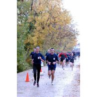 Portrait de coureurs du Running Together, cross organisé pour la seconde fois à Pristina par la KFOR.