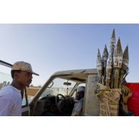 Portrait de soldats tchadiens à bord de leur pick-up sur le camp de Kidal, au Mali.