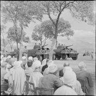 Défilé de Light Armored Car M8 lors de la prise d'armes pour la venue du maréchal Juin à Arris.