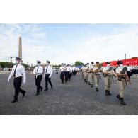 Arrivée de l'école nationale de police (ENP) de Périgueux, du 511e régiment du train (511e RT) et du 24e régiment d'infanterie (24e RI) lors des préparatifs avant le défilé à pied du 14 juillet sur la place de la Concorde.