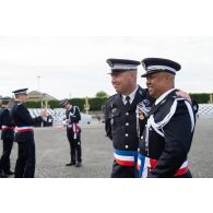 Derniers préparatifs de l'école nationale supérieure de la Police nationale (ENSPN) avant le défilé à pied du 14 juillet sur la place de la Concorde.