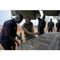 Mise en place d'un élément tracté de réchauffage et de cuisson : Etrac, sur la base de Birao.