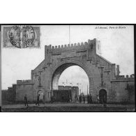 A l'Arsenal, Porte de Bizerte. Pujos, éditeur, photo. Scamaroni - Ferryville. [légende d'origine]