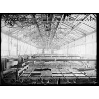 Clermont-Ferrand (Puy-de-Dôme). Usine de caoutchouc Bergougnan. Gommage des toiles. [légende d'origine]