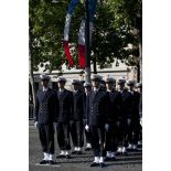 Revue des troupes de l'école navale et de l'école des officiers commissaires de la Marine lors de la cérémonie du 14 juillet 2011.