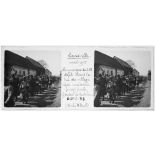 Laviéville, avril 1915. La musique du 118 défile dans la rue du village après une revue passée par le Général de Castelnau (cliché D[octeu]r Paul). [légende d'origine]