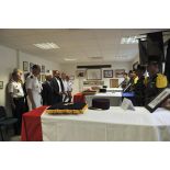 Le ministre des Outre-mer Victorin Lurel se recueille sur les cercueils des marsouins du 9e régiment d'infanterie de marine (9e RIMa) au quartier de la Madeleine à Cayenne, en Guyane française.