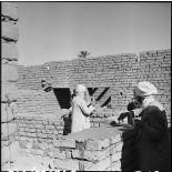 Construction d'habitations à Khanga-Sidi-Nadji.