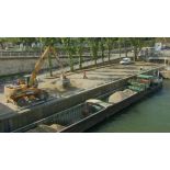 Projet Balard : évacuation des gravats du chantier par camion et chargement dans une péniche sur les quais de Seine (11 juin 2010).