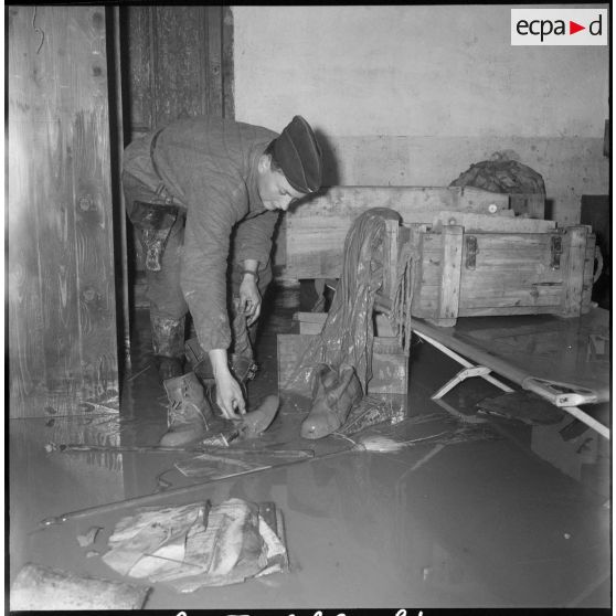 Dégâts causés par une inondation. [Description en cours]