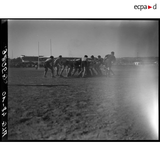 Match de rugby : mêlée.