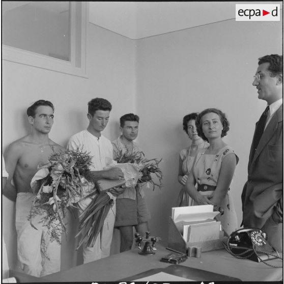 Visite aux blessés. [Description en cours]