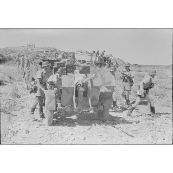 La mise en place d'une batterie de 8,8 cm FlaK et de ses canons de 2 cm FlaK pour sa protection.