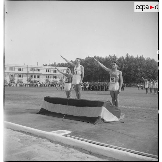 Prestation de serment et salut des athèltes avant la compétition.