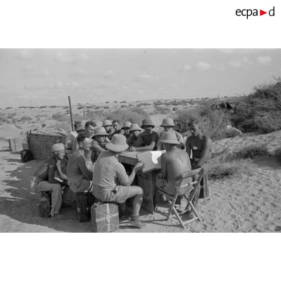 Sur le front de El Quassaba, formation sur le terrain de chauffeurs.