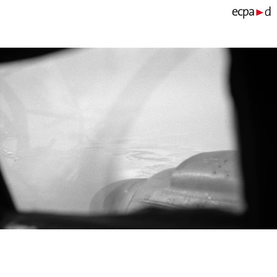 Dans un Heinkel He-111 lors d'une mission de bombardement au sein du Kampfgruppe 100 (KG 100).