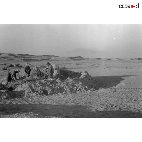 Une alvéole occupée par une pièce de prise Ordnance QF de 25.