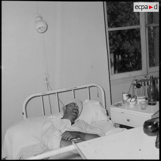 Rappelé blessé lors de l'embuscade de Palestro dans son lit de l'hôpital Maillot d'Alger.