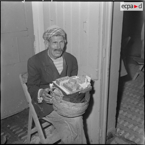 Marchand de cigarettes ambulant.