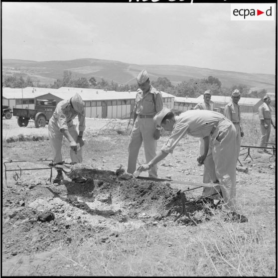 Préparation d'un méchoui.