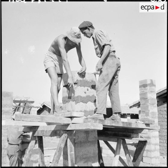 Construction de maisons dans la vallée de la Soumman.