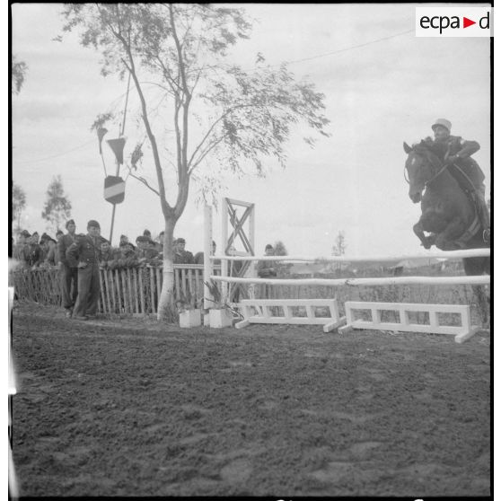 Une compétition hippique. [Description en cours]