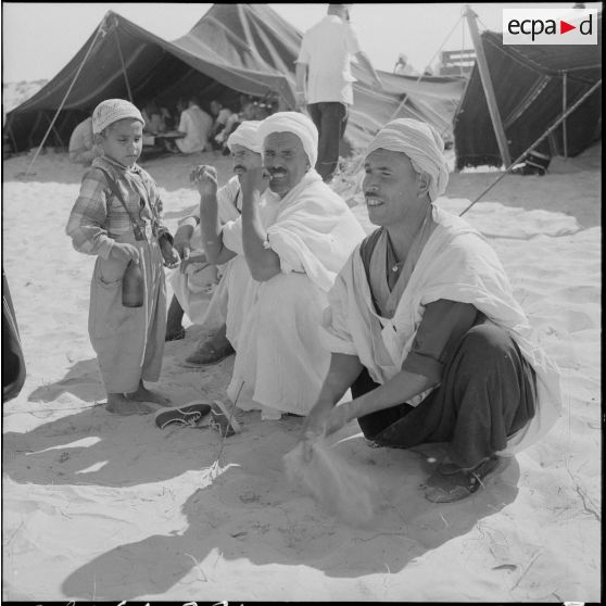 Bir el Adal. Cérémonie de l'échange des montures. Méchoui.