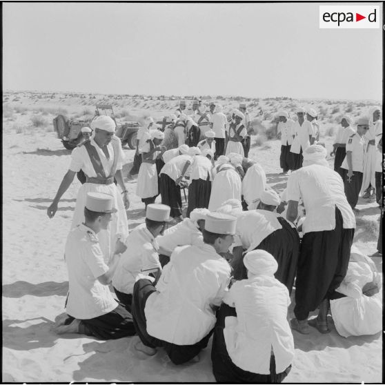Bir el Adal. Cérémonie de l'échange des montures. Méchoui.