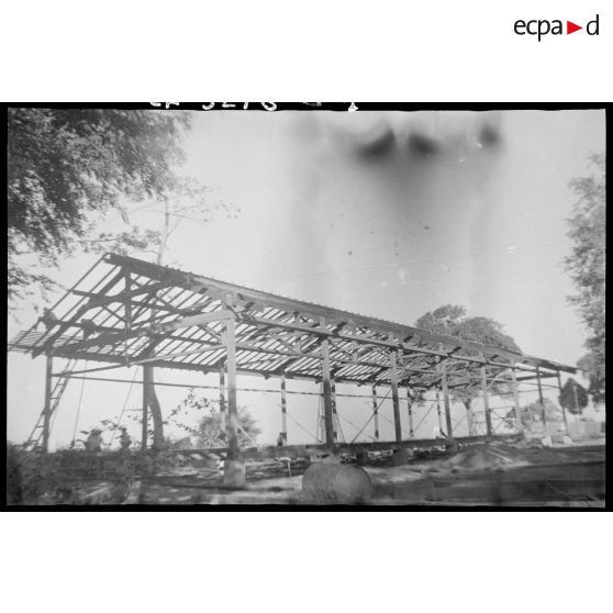 1 à 22 Les différentes phases de construction de bâtiments. [description provisoire]