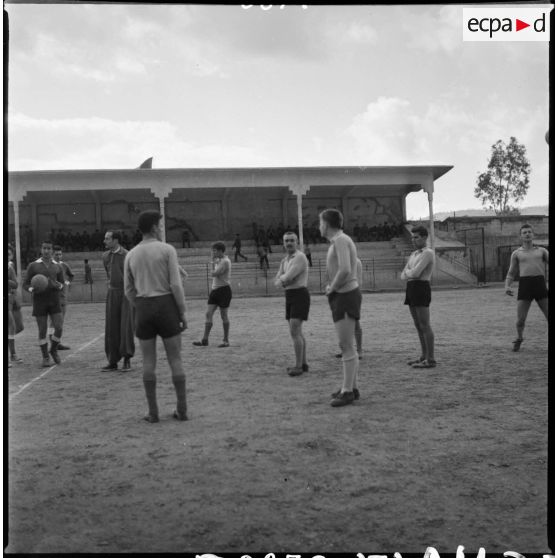 Match de football. [Description en cours]