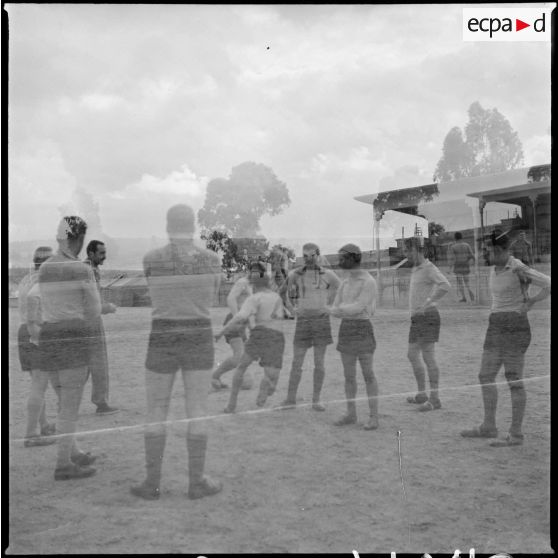 Match de football. [Description en cours]