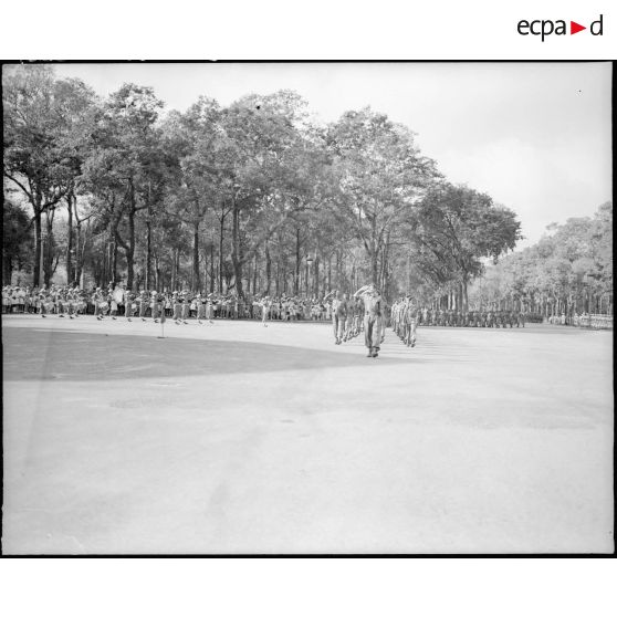 Défilé de la 9e Division d' Infanterie Coloniale (D.I.C.).