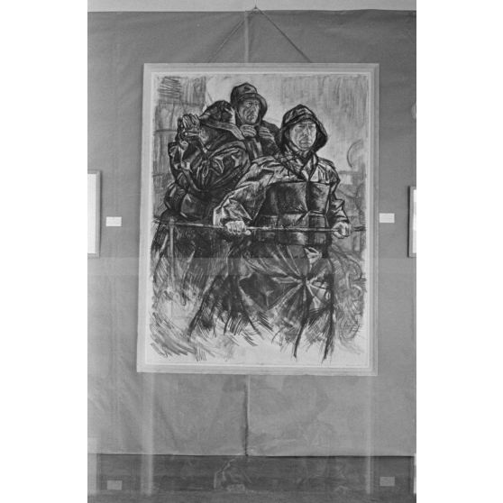 Portrait de trois sous-mariniers dans le kiosque du U-boot.