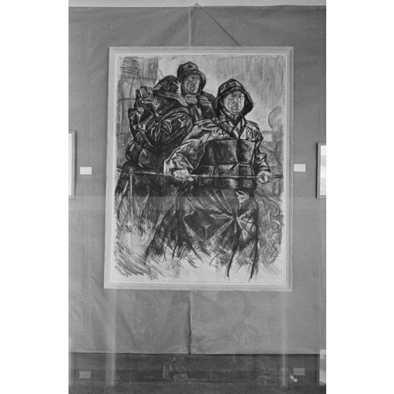 Portrait de trois sous-mariniers dans le kiosque du U-boot.