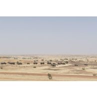 Des véhicules blindés de l'escadron Vert progressent en convoi dans la région de Gao, au Mali.