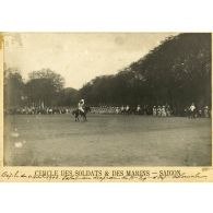Défilé du 11 avril 1906. Salut au drapeau du 11e régiment d'infanterie coloniale. Cercle des soldats et des marins - Saigon. [légende d'origine]