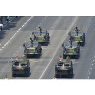 Défilé des blindés et des camions équipés d'un système d'artillerie (CAESAR) du 11e régiment d'artillerie de marine (RAMa) sur les Champs-Elysées, à Paris.