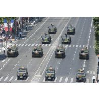Défilé des blindés et des camions équipés d'un système d'artillerie (CAESAR) du 11e régiment d'artillerie de marine (RAMa) sur les Champs-Elysées, à Paris.