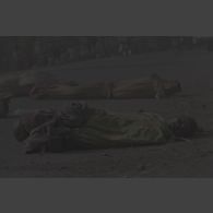 Cadavres abandonnés sur la route au poste-frontière de Goma-Gisenyi. Un enfant mort.