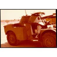 Abeché  - AML (Engins Blindés Légers) touchée par une roquette lors de l'attaque de la colonne ACYL. [légende d'origine]<br>