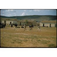[Journée de la Saint-Georges 1958, match de football, le 3/12e RD contre le 4/5e GCP].
