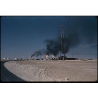 Sahara, puits de pétrole, Buldozer. [légende d'origine]