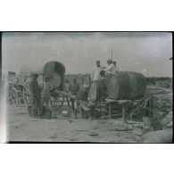 [Camp A. Magasin de la cote 204. On fait de l'eau. Sergent Tabutin].