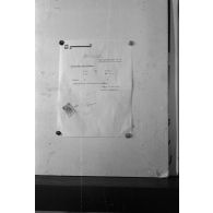 Document photographié au sein de l'imprimerie (image floue).