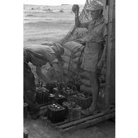 En Afrique, au sein d'une unité de maintenance (Werkstatt Kompanie), la maintenance des batteries de camions et de voitures.