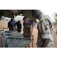 Mise en place d'un élément tracté de réchauffage et de cuisson : Etrac, sur la base de Birao.